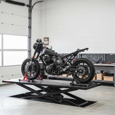 Professional mechanic inspecting a refurbished motorcycle frame in a well-lit workshop